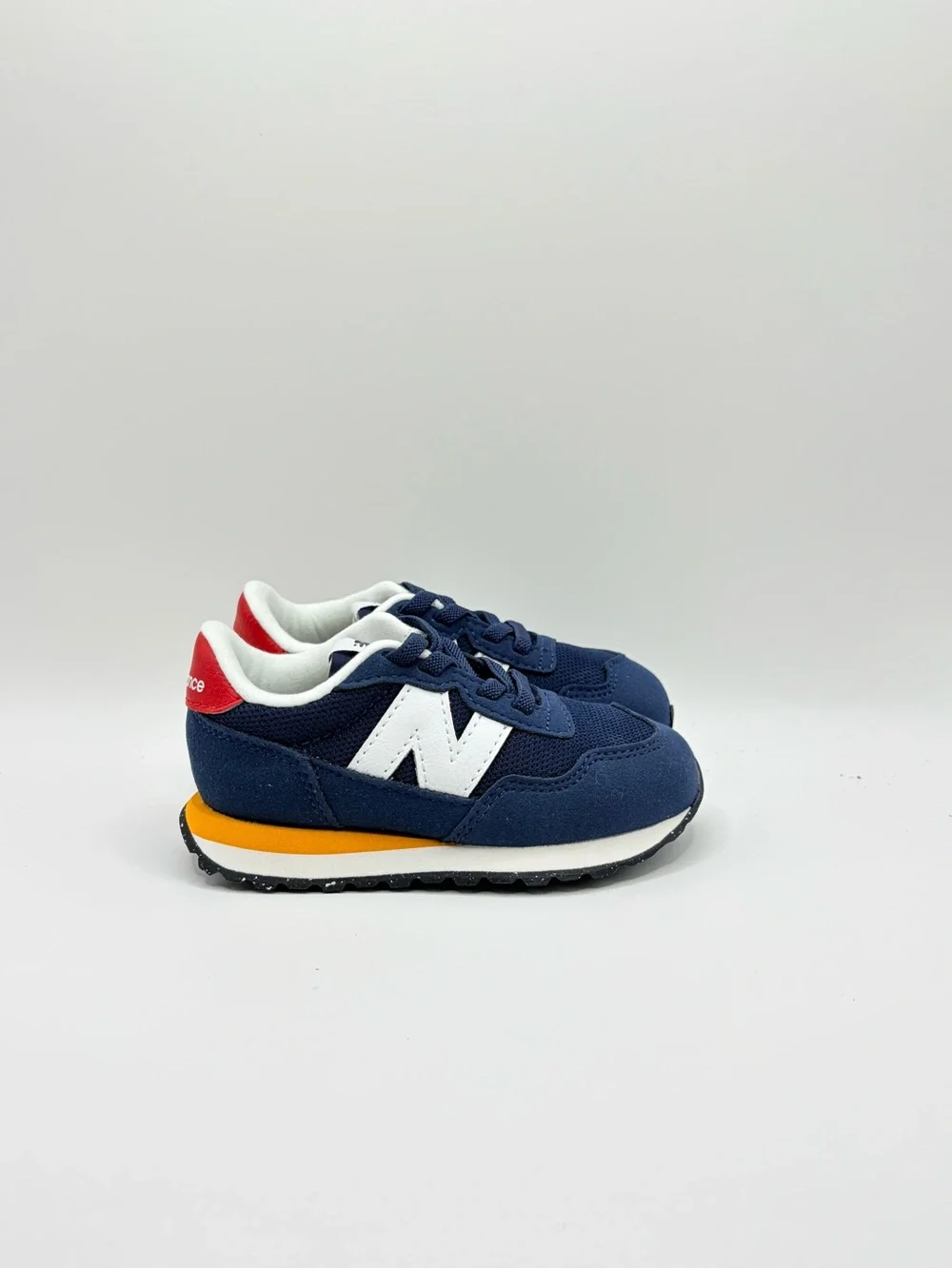 New Balance 237 Bungee Navy Kids Sneakers with White 'N' and Red Heel